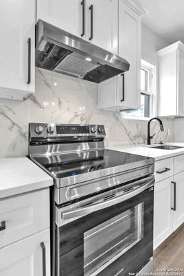 Interior, Kitchen, Marble Walls, Stainless Steel Appliances, Wood Texture Flooring
