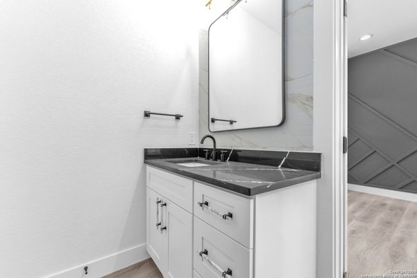 Bathroom, Interior, Marble Walls, Recessed Lighting, Wood Texture Flooring