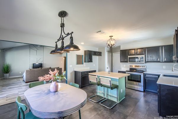 Chandelier, Dining room, Interior, Kitchen, Pendant Lights, Recessed Lighting, Stainless Steel Appliances