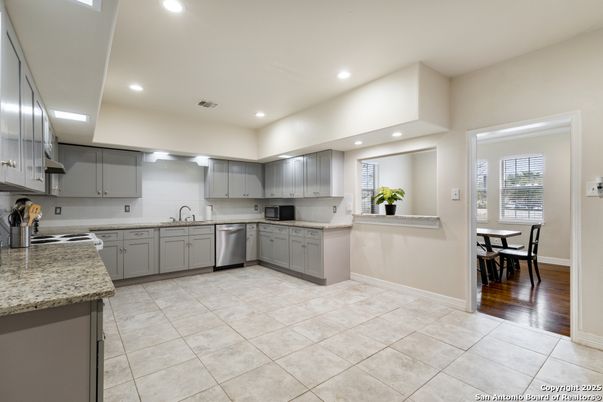 Dining room, Interior, Kitchen, Recessed Lighting, Stainless Steel Appliances, Wood Texture Flooring