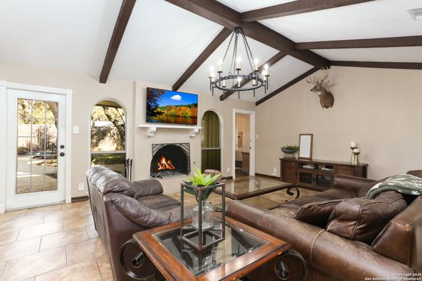 Chandelier, Fireplace, Interior, Living room, Wooden Beams