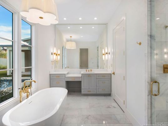 Bathroom, Dual Sink Vanities, Free Standing Baths, Glass Shower, Interior, Marble, Marble Walls, Recessed Lighting