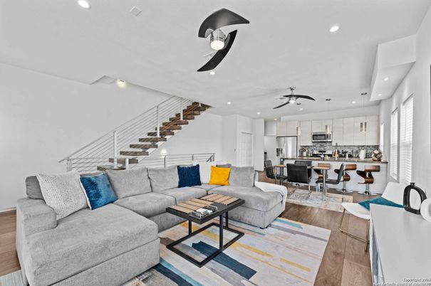 Dining room, Interior, Kitchen, Living room, Pendant Lights, Recessed Lighting, Stainless Steel Appliances, Wood Texture Flooring