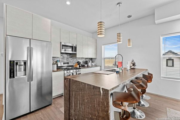 Interior, Kitchen, Pendant Lights, Recessed Lighting, Stainless Steel Appliances, Wood Texture Flooring