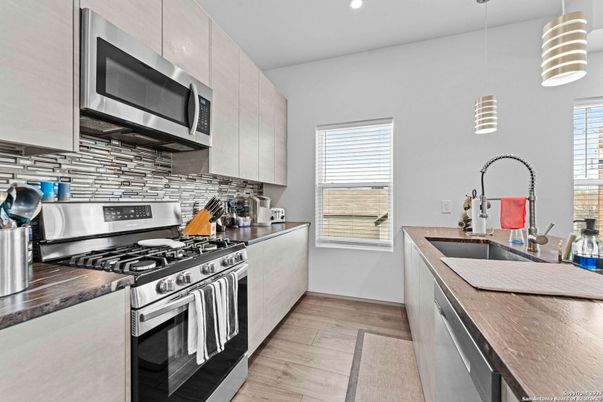 Interior, Kitchen, Pendant Lights, Recessed Lighting, Stainless Steel Appliances, Wood Texture Flooring