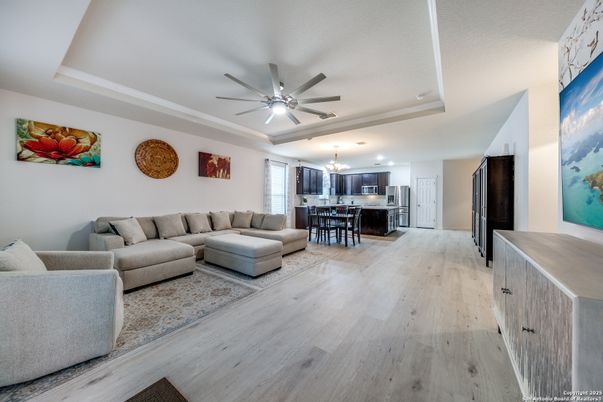 Chandelier, Dining room, Interior, Kitchen, Living room, Recessed Lighting, Stainless Steel Appliances, Wood Texture Flooring