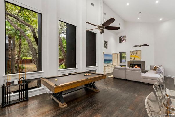 Billiard Table, Fireplace, Game Room, Interior, Living room, Recessed Lighting, Wood Texture Flooring