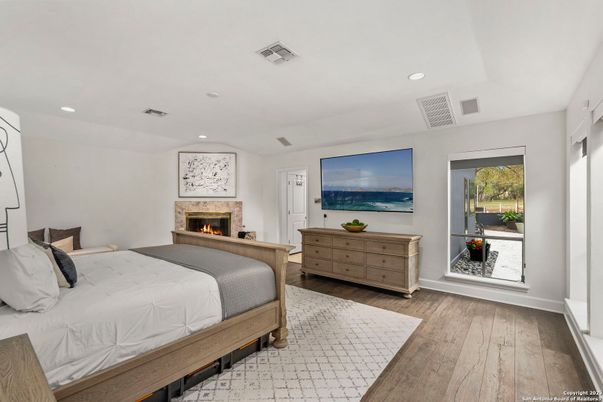 Bedroom, Fireplace, Interior, Recessed Lighting, Wood Texture Flooring