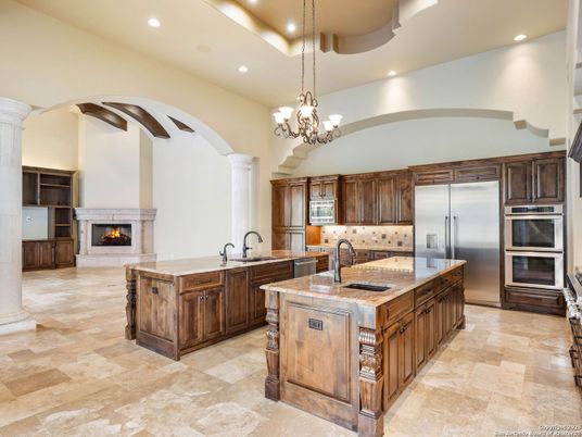Chandelier, Fireplace, Interior, Kitchen, Recessed Lighting, Stainless Steel Appliances