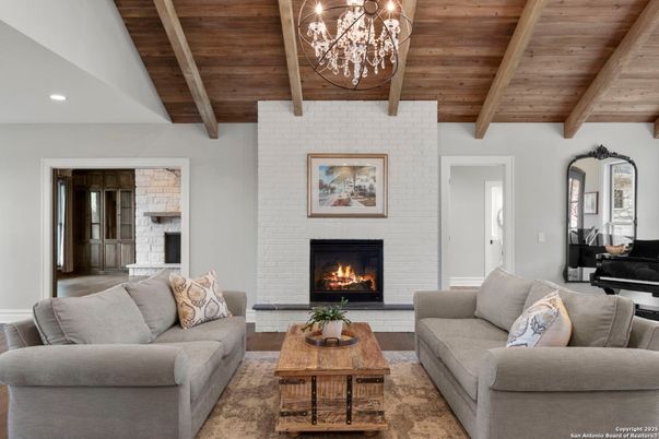 Chandelier, Fireplace, Interior, Living room, Recessed Lighting, Stone Walls, Wooden Beams, Wooden Ceilings