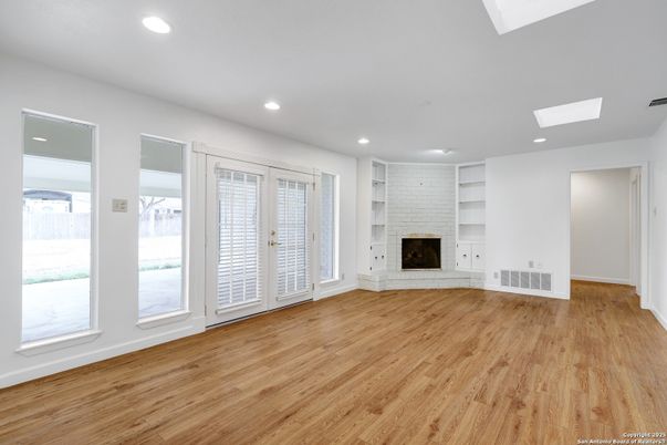 Empty room, Fireplace, Interior, Recessed Lighting, Wood Texture Flooring