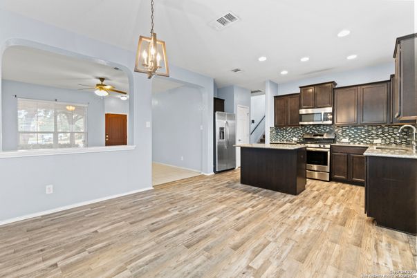 Interior, Kitchen, Pendant Lights, Recessed Lighting, Stainless Steel Appliances, Wood Texture Flooring
