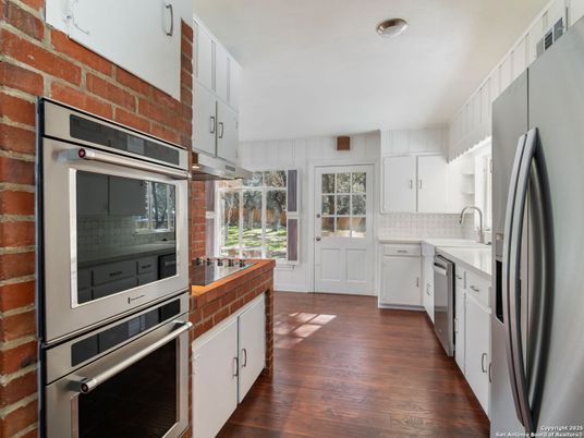 Interior, Kitchen, Recessed Lighting, Stainless Steel Appliances, Stone Walls, Wood Texture Flooring
