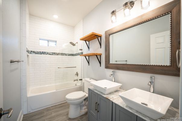 Bathroom, Dual Sink Vanities, Glass Shower, Interior, Recessed Lighting, Wood Texture Flooring