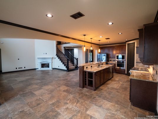 Fireplace, Interior, Kitchen, Pendant Lights, Recessed Lighting, Stainless Steel Appliances