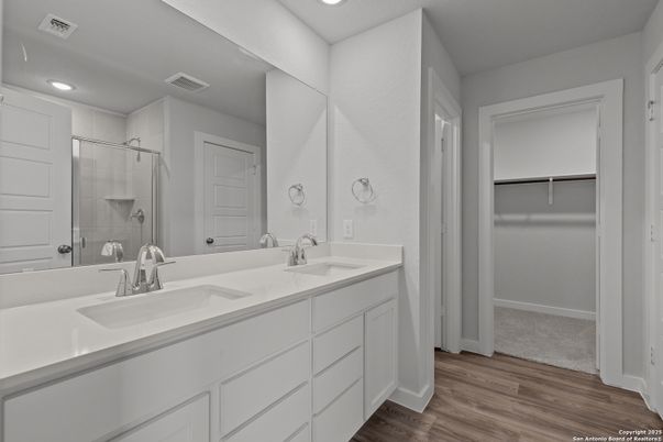 Bathroom, Dual Sink Vanities, Interior, Recessed Lighting, Wood Texture Flooring