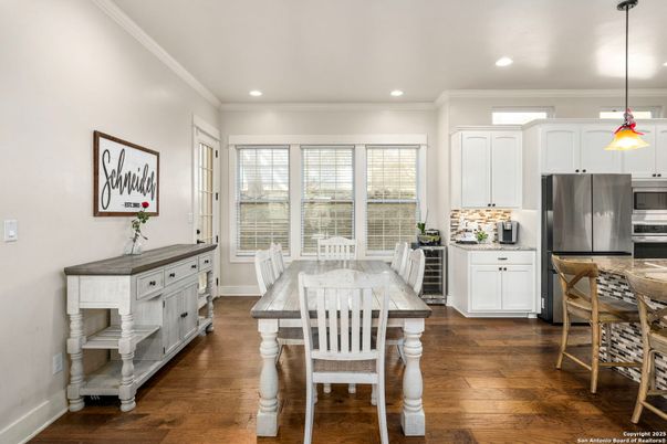 Dining room, Interior, Kitchen, Pendant Lights, Recessed Lighting, Stainless Steel Appliances, Wood Texture Flooring