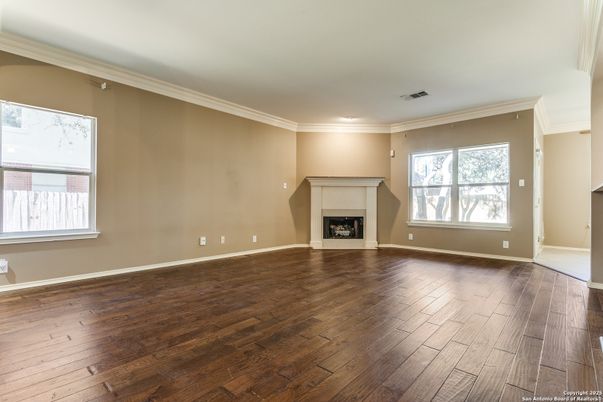 Empty room, Fireplace, Interior, Recessed Lighting, Wood Texture Flooring