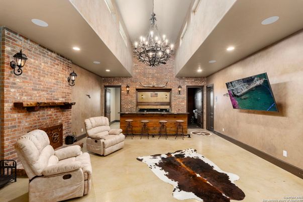 Chandelier, Fireplace, Interior, Recessed Lighting, Stone Walls