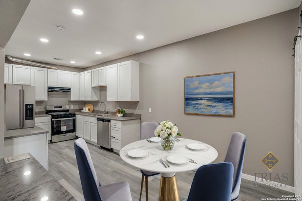 Dining room, Interior, Kitchen, Marble, Recessed Lighting, Stainless Steel Appliances, Wood Texture Flooring