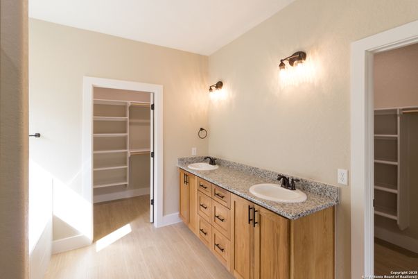 Bathroom, Dual Sink Vanities, Interior, Walk-in Closets, Wood Texture Flooring