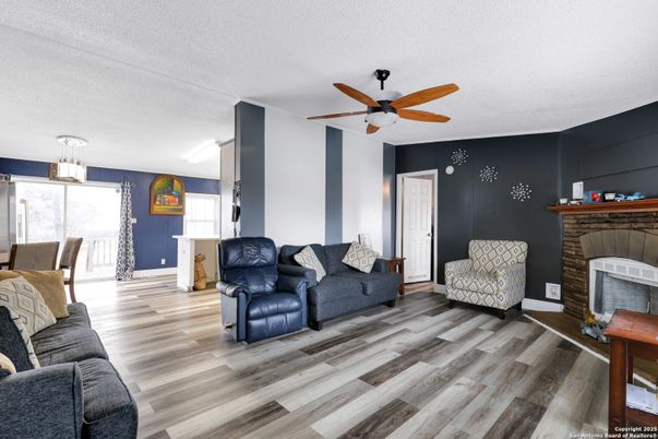 Dining room, Fireplace, Interior, Living room, Pendant Lights, Wood Texture Flooring
