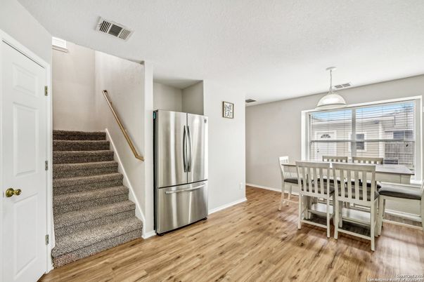 Dining room, Interior, Kitchen, Pendant Lights, Stainless Steel Appliances, Wood Texture Flooring