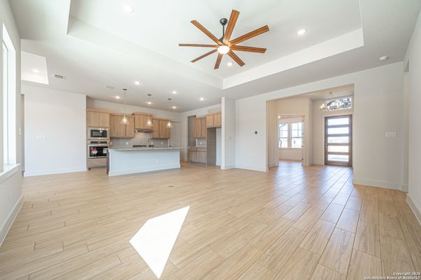Chandelier, Interior, Kitchen, Pendant Lights, Recessed Lighting, Stainless Steel Appliances, Wood Texture Flooring