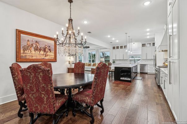 Chandelier, Dining room, Interior, Kitchen, Pendant Lights, Recessed Lighting, Stainless Steel Appliances, Wood Texture Flooring