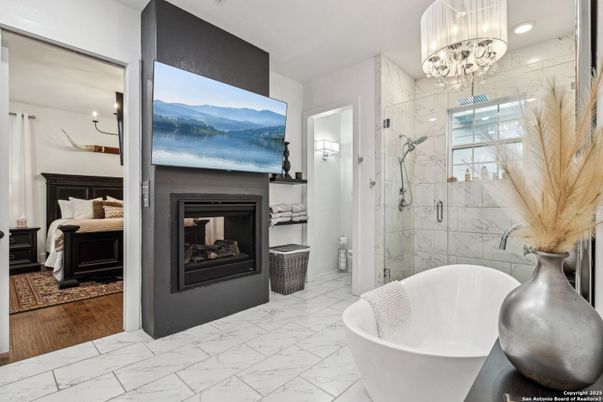 Bathroom, Bedroom, Chandelier, Fireplace, Free Standing Baths, Glass Shower, Interior, Marble, Marble Walls, Recessed Lighting, Wood Texture Flooring