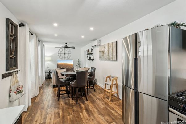 Dining room, Interior, Kitchen, Recessed Lighting, Stainless Steel Appliances, Wood Texture Flooring