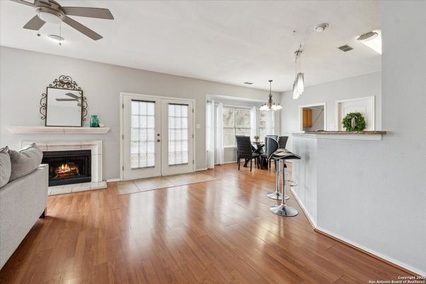 Chandelier, Dining room, Fireplace, Interior, Pendant Lights, Wood Texture Flooring