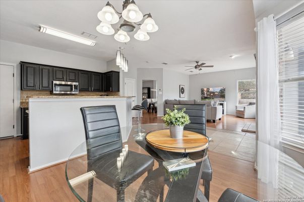 Dining room, Interior, Kitchen, Living room, Pendant Lights, Stainless Steel Appliances, Wood Texture Flooring
