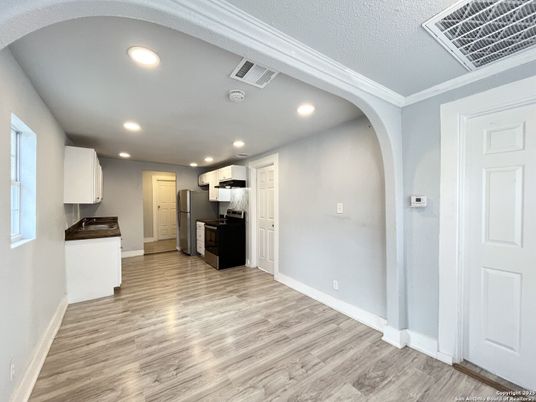 Interior, Kitchen, Recessed Lighting, Stainless Steel Appliances, Wood Texture Flooring