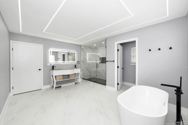Bathroom, Free Standing Baths, Glass Shower, Interior, Marble, Marble Walls, Recessed Lighting