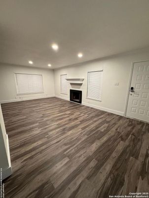 Empty room, Fireplace, Interior, Recessed Lighting, Wood Texture Flooring