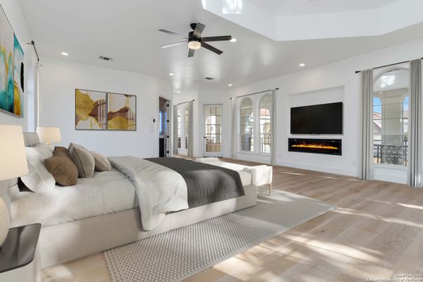 Bedroom, Fireplace, Interior, Recessed Lighting, Wood Texture Flooring