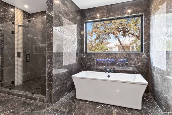 Bathroom, Free Standing Baths, Glass Shower, Interior, Marble, Marble Walls, Recessed Lighting