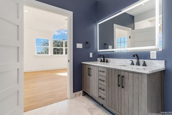 Bathroom, Dual Sink Vanities, Interior, Recessed Lighting, Wood Texture Flooring