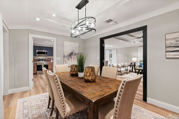 Dining room, Interior, Kitchen, Pendant Lights, Recessed Lighting, Stainless Steel Appliances, Wood Texture Flooring