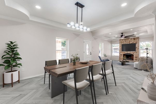 Dining room, Fireplace, Interior, Living room, Pendant Lights, Recessed Lighting, Wood Texture Flooring