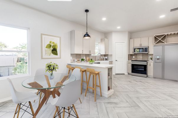 Dining room, Interior, Kitchen, Pendant Lights, Recessed Lighting, Stainless Steel Appliances, Wood Texture Flooring