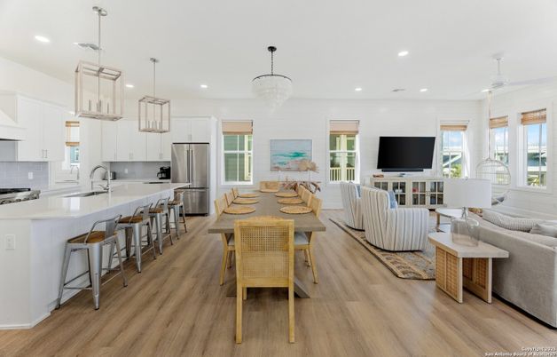 Dining room, Interior, Kitchen, Living room, Pendant Lights, Recessed Lighting, Stainless Steel Appliances, Wood Texture Flooring
