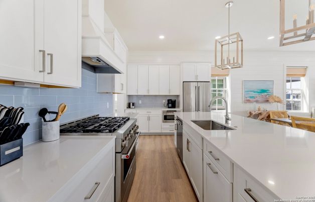 Interior, Kitchen, Pendant Lights, Recessed Lighting, Stainless Steel Appliances, Wood Texture Flooring