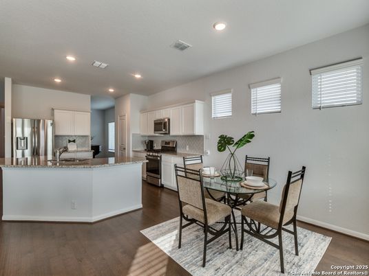 Dining room, Interior, Kitchen, Recessed Lighting, Stainless Steel Appliances, Wood Texture Flooring