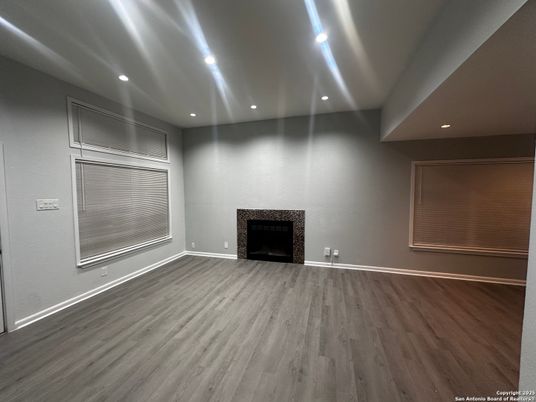 Empty room, Fireplace, Interior, Recessed Lighting, Wood Texture Flooring