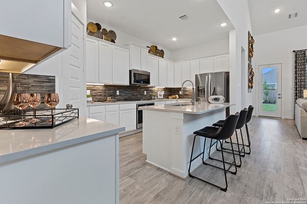 Fireplace, Interior, Kitchen, Recessed Lighting, Stainless Steel Appliances, Wood Texture Flooring