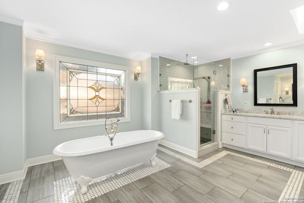 Bathroom, Dual Sink Vanities, Free Standing Baths, Glass Shower, Interior, Recessed Lighting, Wood Texture Flooring