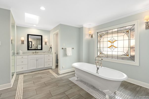 Bathroom, Dual Sink Vanities, Free Standing Baths, Interior, Recessed Lighting, Wood Texture Flooring