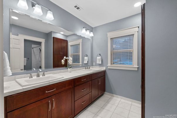 Bathroom, Dual Sink Vanities, Interior, Recessed Lighting, Tile Countertops